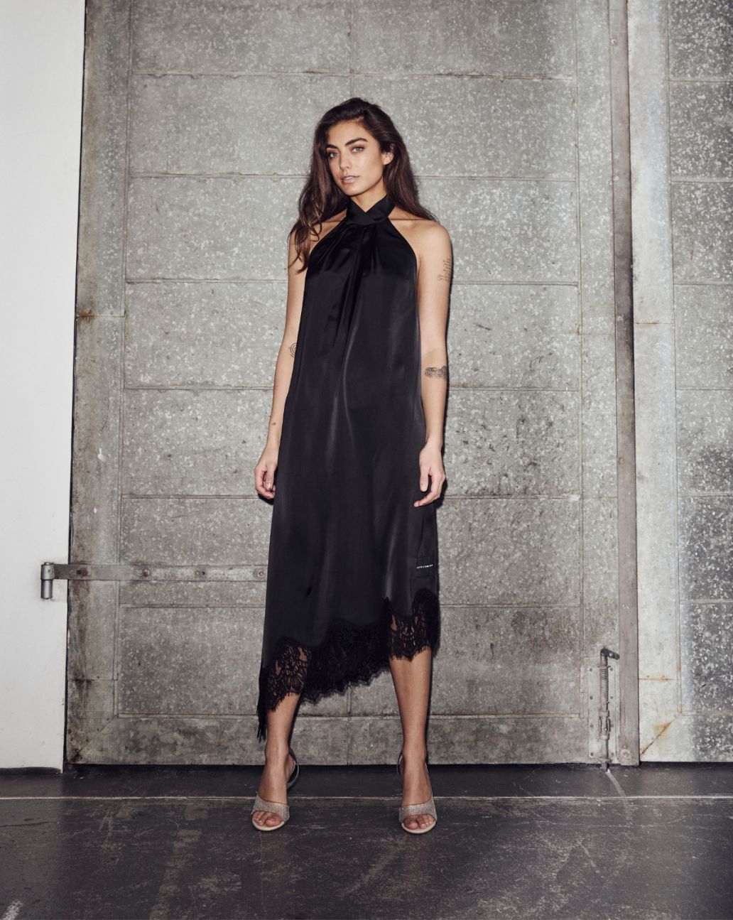 
Haute L'Amitié Naomi Asym Halter Dress Zwart
